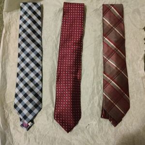 Selling three ties, Calvin Klein, Nautica, and a one I can't make out.